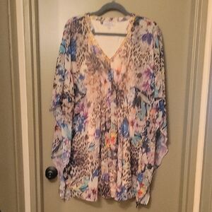 Jennifer Lopez Vibrant Floral and Leopard Midi Dress